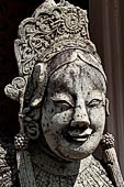 Bangkok Wat Arun - the gallery is lined all around with beautiful statues of chinese figures. 